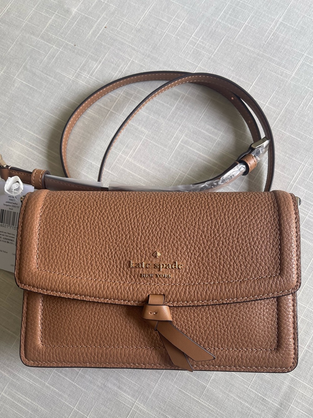 Kate Spade Tan Pebbled Leather Crossbody with Tassel Accent